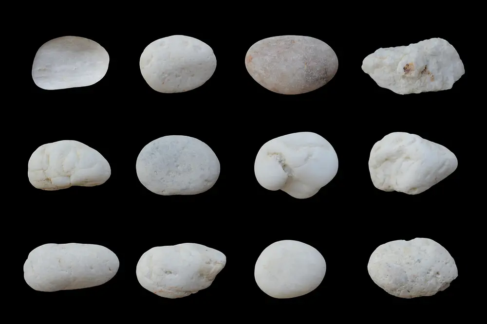 rows of stones on black background